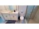 Modern bathroom features a marble-top vanity with storage and a glass enclosed shower at 9048 Luna Ln, Sarasota, FL 34241