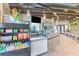 Community cafe featuring a bar, a snack area, and comfortable seating with views of the community at 9048 Luna Ln, Sarasota, FL 34241