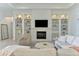 Elegant living room with fireplace, built-in shelving, and comfortable seating area at 9048 Luna Ln, Sarasota, FL 34241
