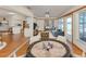 Open-concept living space flows into the dining room, bedroom, and kitchen at 976 Euclid Rd, Venice, FL 34293