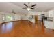 Spacious open living area features hardwood floors, vaulted ceilings and recessed lighting at 976 Euclid Rd, Venice, FL 34293