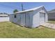 Exterior view of the backyard shed for extra storage space at 976 Euclid Rd, Venice, FL 34293