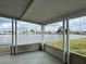 Serene view from the patio overlooking a tranquil lake and surrounding community at 103 Lakeview Dr, North Port, FL 34287