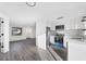 Bright kitchen boasts stainless steel appliances, white cabinets, and modern countertops at 1032 Elaine St, Venice, FL 34285