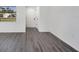 Bright living area with sleek flooring, a view of the exterior, and ample natural light at 1032 Elaine St, Venice, FL 34285