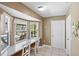 Breakfast nook features windows with a scenic view of the pool and outdoor area at 10444 Willmington Blvd, Englewood, FL 34224