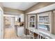 Well-lit kitchen area with a breakfast nook overlooking the pool and backyard at 10444 Willmington Blvd, Englewood, FL 34224