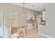 Eat-in kitchen showcasing modern appliances, a dining nook, and plenty of natural light at 1104 Auburn Cove Cir, Venice, FL 34292