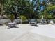 Expansive community patio offers outdoor seating for gatherings and relaxation at 114 Southampton N Pl # 237, Venice, FL 34293