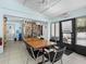 Cozy meeting room features shelving, tile floors, and community resources at 114 Southampton N Pl # 237, Venice, FL 34293