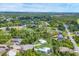 Beautiful aerial view of the community showcasing lush greenery and well-maintained homes at 1214 Rumson Ct, North Port, FL 34288