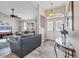 Inviting living room featuring wood floors, neutral paint, and front door at 1214 Rumson Ct, North Port, FL 34288