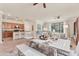 Open living space including kitchen and dining, creating a perfect entertaining area at 12370 Canavese Ln, Venice, FL 34293