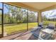 Relaxing screened patio with outdoor seating, perfect for enjoying the serene views at 12370 Canavese Ln, Venice, FL 34293