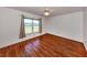Sunlit bedroom with a view of a pond at 1240 Lucaya Ave, Venice, FL 34285