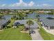 An aerial view of the home showcasing its beautiful location on a waterfront at 1240 Lucaya Ave, Venice, FL 34285