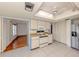 Open kitchen has plenty of storage, modern appliances, ceiling fan, and tile flooring throughout at 1240 Lucaya Ave, Venice, FL 34285