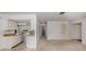 Bright living room flows into kitchen with butcher block countertops and neutral walls, a versatile and inviting space at 1240 Lucaya Ave, Venice, FL 34285
