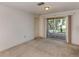 Neutral living room with backyard access, offering a clean and versatile space for comfortable living at 1240 Lucaya Ave, Venice, FL 34285