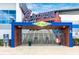 Entrance to CoolToday Park, showcasing the Braves branding and inviting atmosphere for baseball enthusiasts at 12440 Wellen Golf St # 204, Venice, FL 34293