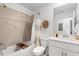 Bathroom featuring a shower-tub combo and a single sink vanity at 12440 Wellen Golf St # 204, Venice, FL 34293