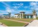 Bocce ball court near the clubhouse, offering outdoor recreation amid lush landscaping and manicured grounds at 12440 Wellen Golf St # 204, Venice, FL 34293