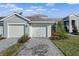 Contemporary home with two-car garage and paver driveway at 12440 Wellen Golf St # 204, Venice, FL 34293