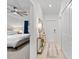 Inviting hallway showcasing stylish decor, leading to a bedroom and other living spaces at 12440 Wellen Golf St # 204, Venice, FL 34293