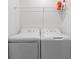 Bright laundry room with white washer and dryer at 12440 Wellen Golf St # 204, Venice, FL 34293
