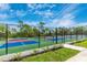 Multiple tennis courts, providing ample space for recreational play within a well-maintained and inviting community setting at 12440 Wellen Golf St # 204, Venice, FL 34293