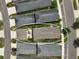 Aerial view of the back of a home with a roof patio and seating at 12689 Sagewood Dr, Venice, FL 34293