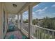 Relaxing balcony view of homes, featuring stylish outdoor seating and an airy atmosphere at 12689 Sagewood Dr, Venice, FL 34293