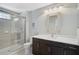 Bathroom featuring glass enclosed shower and modern vanity at 12689 Sagewood Dr, Venice, FL 34293