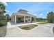Community pavilion with picnic tables, and lake view at 12689 Sagewood Dr, Venice, FL 34293