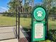 Community dog park featuring secure fencing and clear signage outlining park rules for responsible pet owners at 12705 Pinnacle Ln, Venice, FL 34293