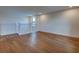 Spacious living room with hardwood floors and plenty of natural light at 12705 Pinnacle Ln, Venice, FL 34293