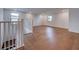 Spacious living room with hardwood floors and plenty of natural light at 12705 Pinnacle Ln, Venice, FL 34293