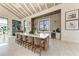 Stylish amenity center featuring a large island, modern appliances, and ample seating for gatherings at 12816 Morning Mist Pl, Venice, FL 34293