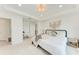 Bright main bedroom featuring a desk and ample natural light at 12816 Morning Mist Pl, Venice, FL 34293