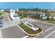Elegant gated community entrance with guard house, signage, and lush landscaping welcomes residents and guests at 12816 Morning Mist Pl, Venice, FL 34293
