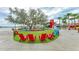 Community green space with colorful seating and dining options for residents to enjoy at 12816 Morning Mist Pl, Venice, FL 34293