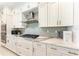 Beautiful gourmet kitchen featuring stainless steel appliances and modern countertops at 12816 Morning Mist Pl, Venice, FL 34293