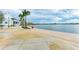 Picturesque waterfront boardwalk with seating, perfect for relaxing by the lake at Wellen Park at 12816 Morning Mist Pl, Venice, FL 34293