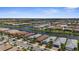 Expansive aerial view of a residential community with serene waterways and lush landscaping at 13486 Nobilio St, Venice, FL 34293