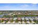 Beautiful aerial view of a residential community with scenic waterways and landscaped yards at 13486 Nobilio St, Venice, FL 34293