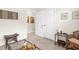Neutral bedroom with decorative wall art, double door closet, and accent furniture at 13486 Nobilio St, Venice, FL 34293
