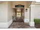 Inviting clubhouse entrance with IslandWalk signage, tile flooring, and gated access to the pool area at 13486 Nobilio St, Venice, FL 34293