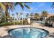 Inviting in-ground hot tub with a decorative tile surround within the resort's community area at 13486 Nobilio St, Venice, FL 34293