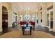 This spectacular lobby features cathedral ceilings, a fireplace and comfortable seating at 13486 Nobilio St, Venice, FL 34293