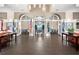 Elegant lobby with comfortable seating, flag displays, and access to various event spaces, ideal for gatherings at 13486 Nobilio St, Venice, FL 34293